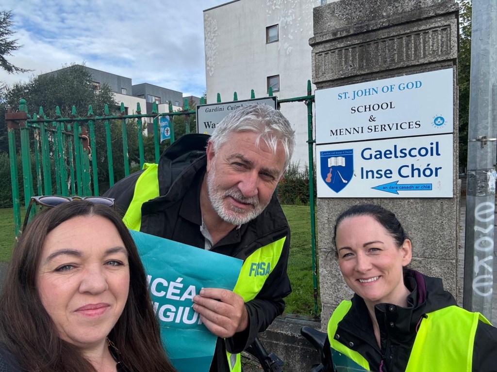 Standing with School Secretaries and&nbsp;Caretakers